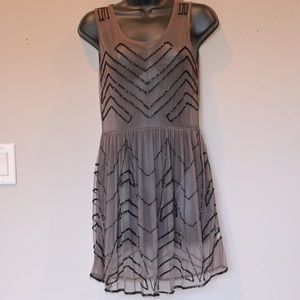 Adorable Free People Beaded Sheer Dress.